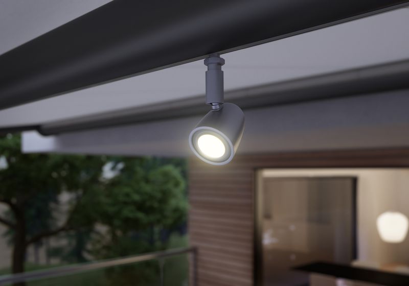 Detailed view of an LED spotlight on the fabric support tube of a markilux pergola