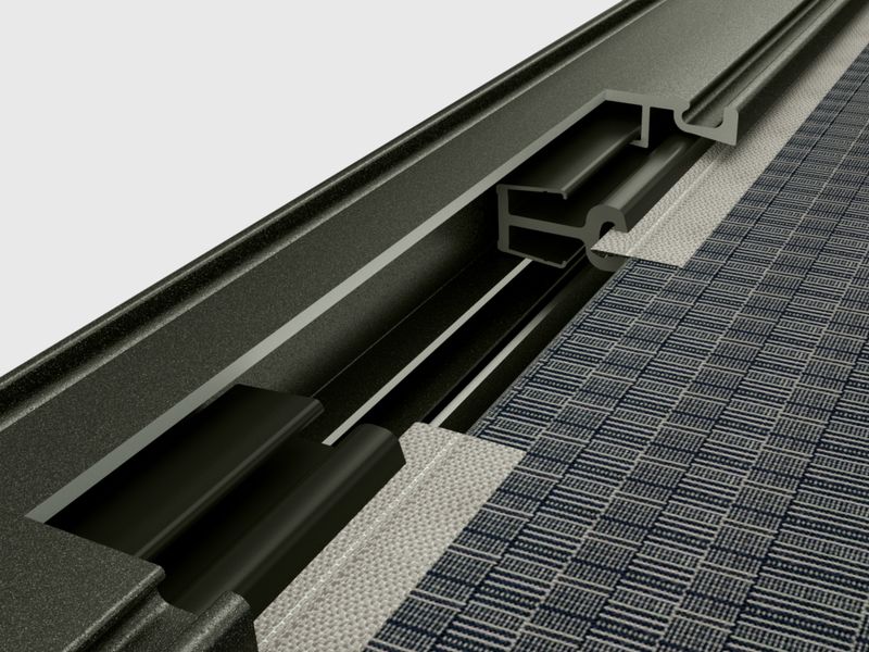 Detailed view of the lateral fabric guide without gap between awning cover and guide track for markilux under-glass awnings.